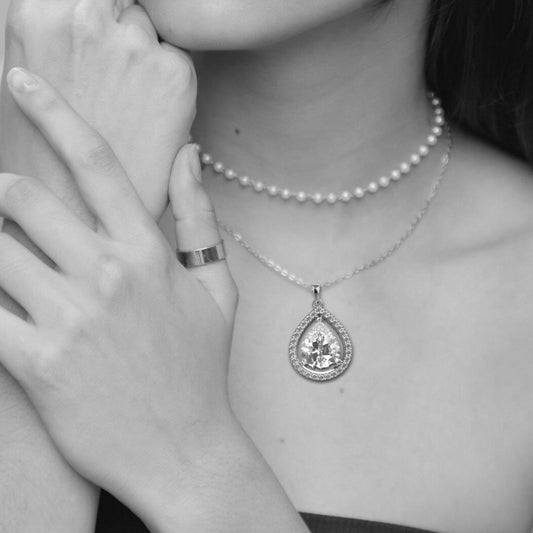 Avarta Sterling Silver Pear Solitaire Halo Pendant With Chain in White Gold Polish