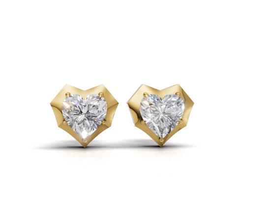 Pair of heart shape lab grown diamond stud earrings in faceted yellow gold frames, front view